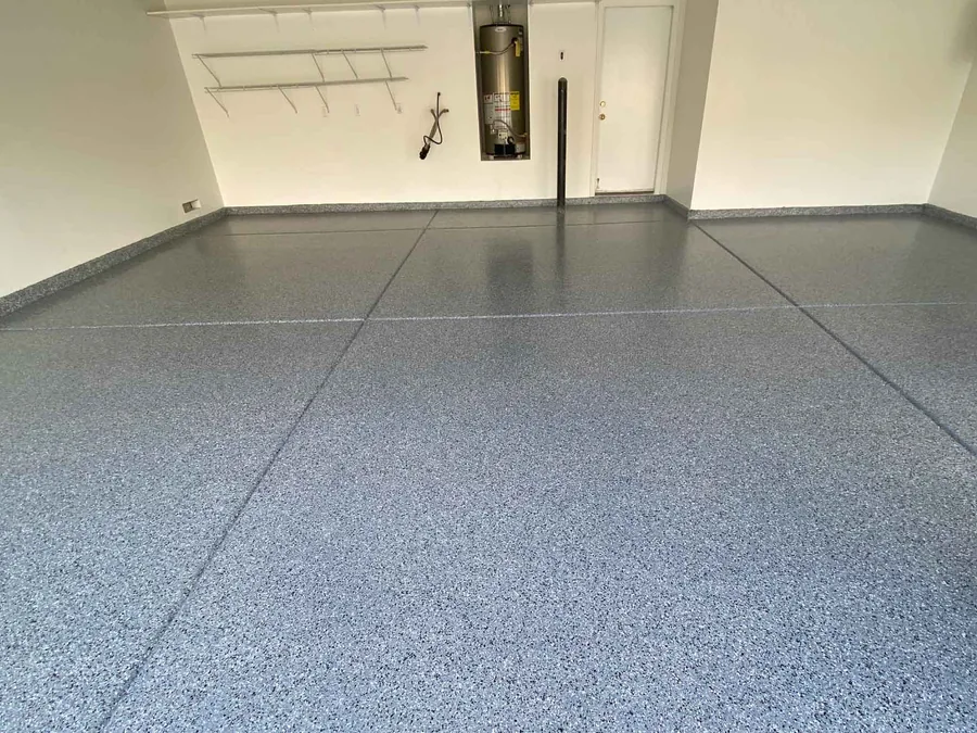 Gray flake epoxy coating on a two-car garage floor